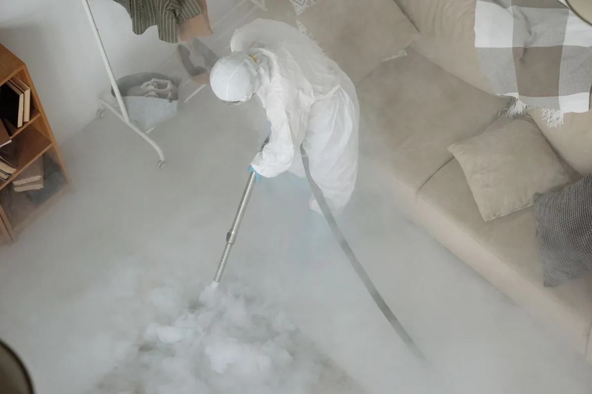 Biohazard cleanup technician in protective equipment, Sun Valley, NV